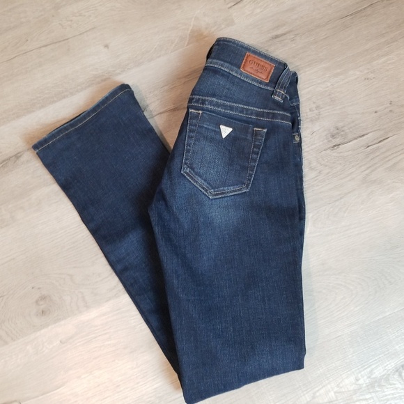 jeans with triangle logo on back pocket